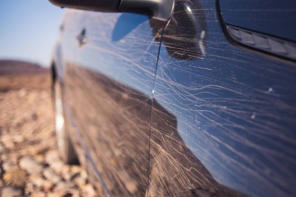 Metallic clean shiny black car paint hi-res stock photography and